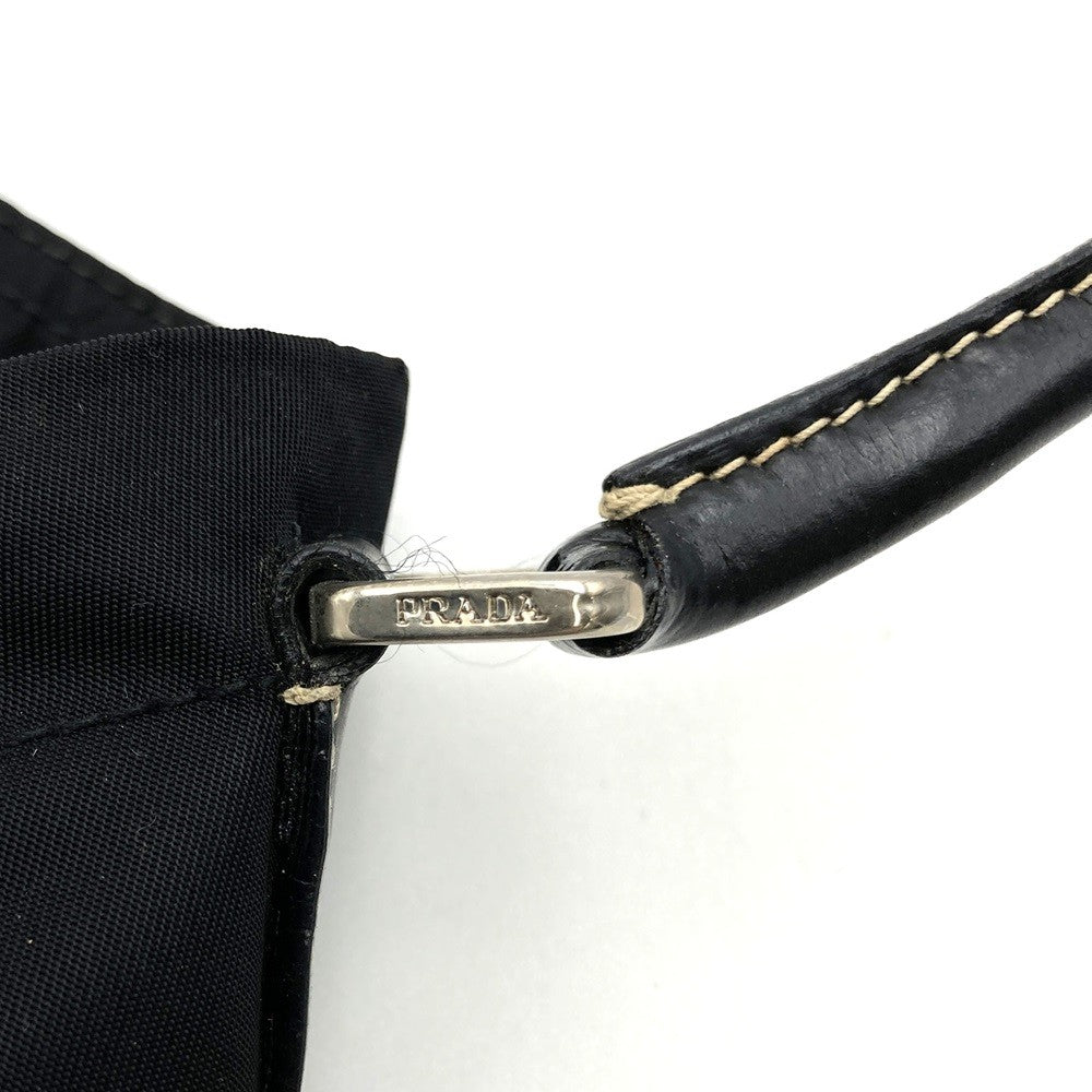 Prada handbag tote bag with triangle logo in nylon/leather, black PRE-OWNED