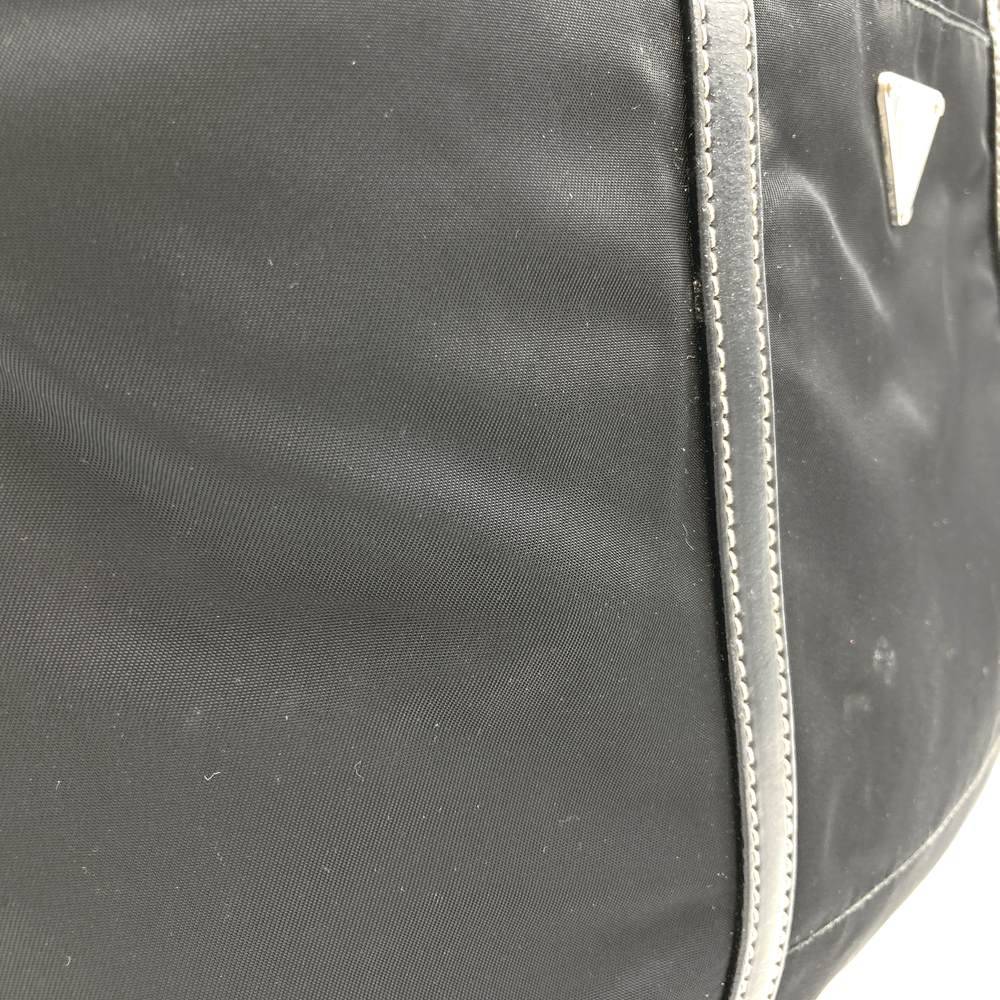 Prada handbag tote bag with triangle logo in nylon/leather, black PRE-OWNED