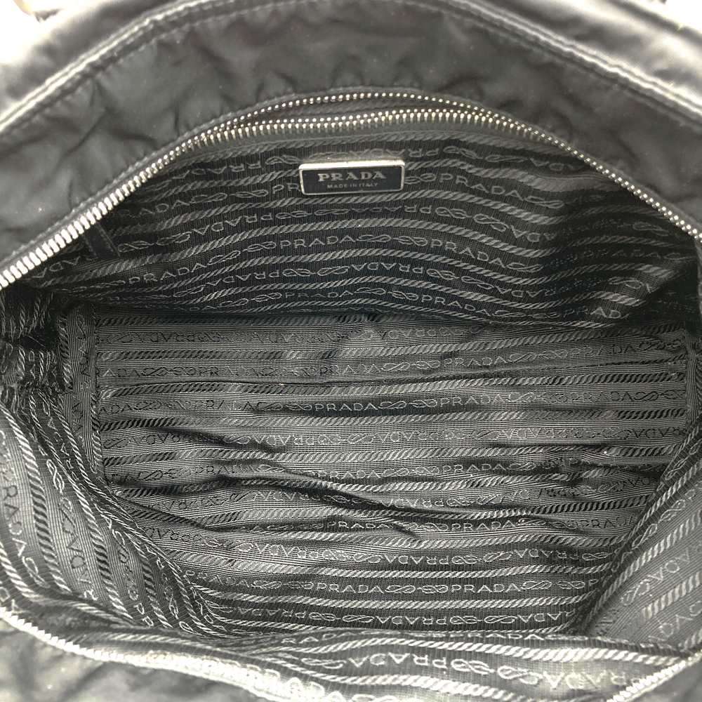 Prada handbag tote bag with triangle logo in nylon/leather, black PRE-OWNED